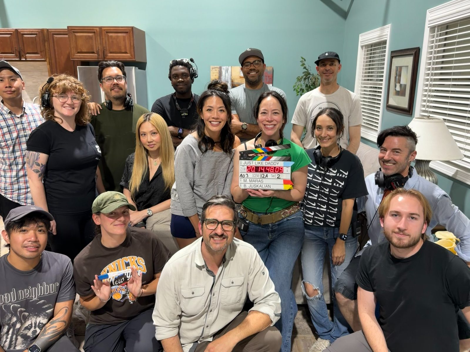 Cast and crew of Just Like Daddy with the slate
